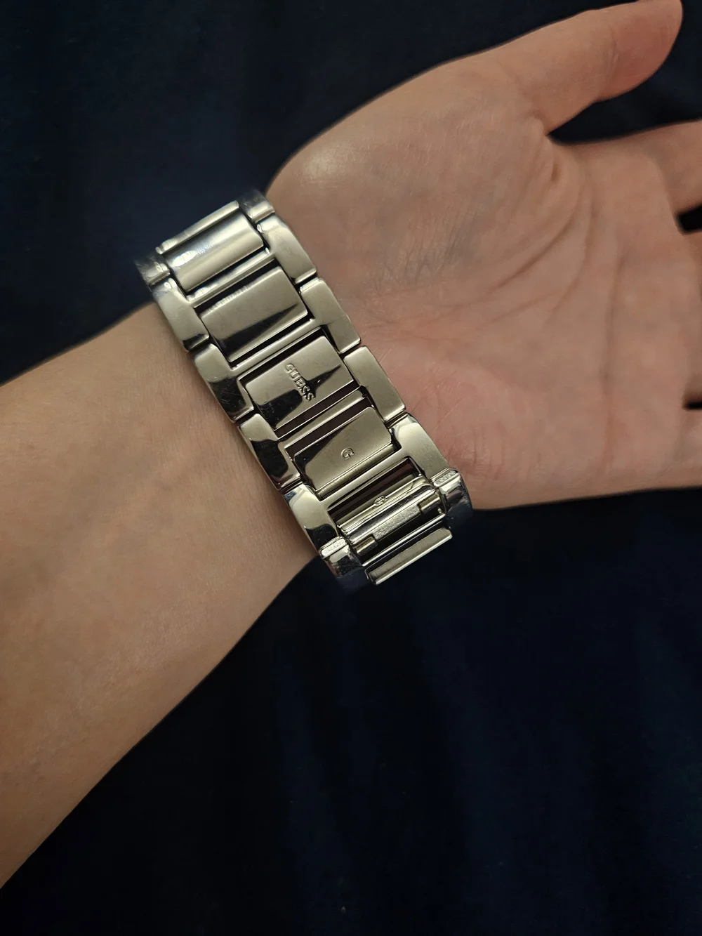 GUESS Women's Silver Tone Pink Ribbon Crystal Bracelet Watch